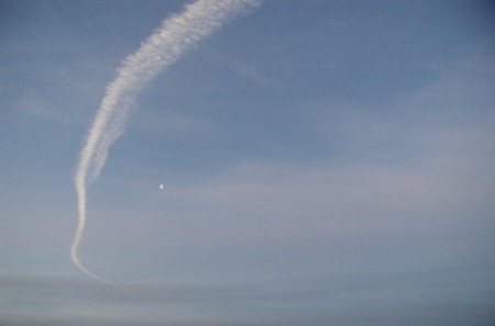 Contrail from L-1011 jumbo jet carrying a Pegasus XL rocket and ST5 satellite
