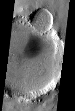 Mars Odyssey spacecraft THEMIS instrument image of floor flow in martian craters