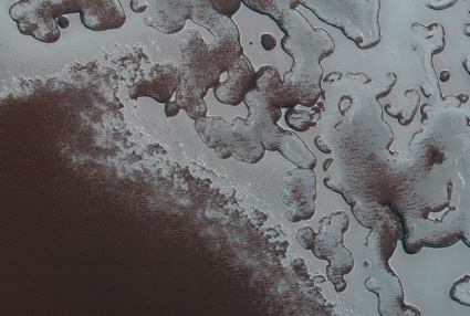 Mars Reconnaissance Orbiter HiRISE photo of the edge of Mars' south polar cap.