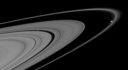 Saturn's rings and moons Pan and Prometheus